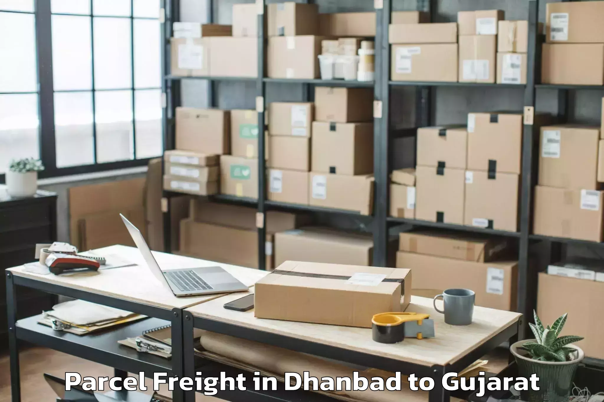 Comprehensive Dhanbad to Saurashtra University Rajkot Parcel Freight